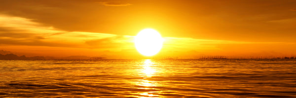 panoramic-3-piece-canvas-print-glowing-sunset-on-the-water-panorama