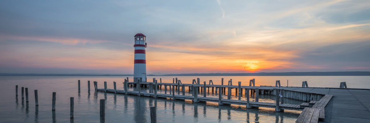 panoramic-3-piece-acrylic-print-lighthouse-in-the-sunset-panorama
